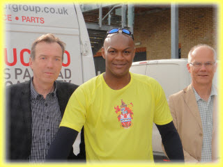 First team manager Marcus Gayle flanked by the two Görans